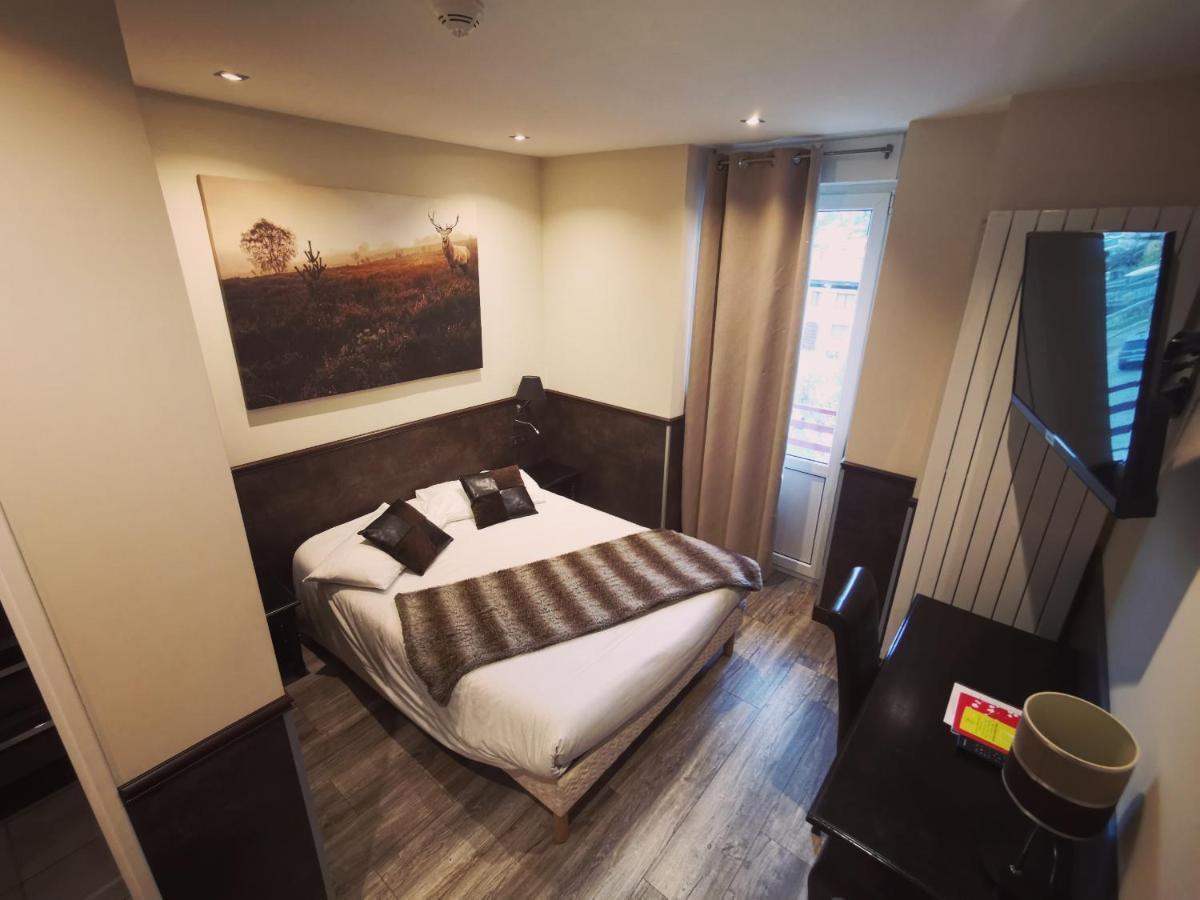 Logis Hotel Des Bains Жерарме Экстерьер фото